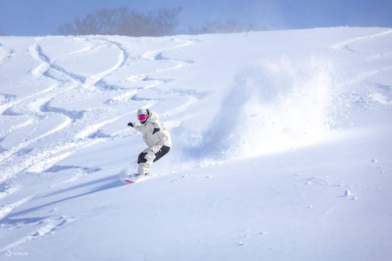 person riding a snowboard