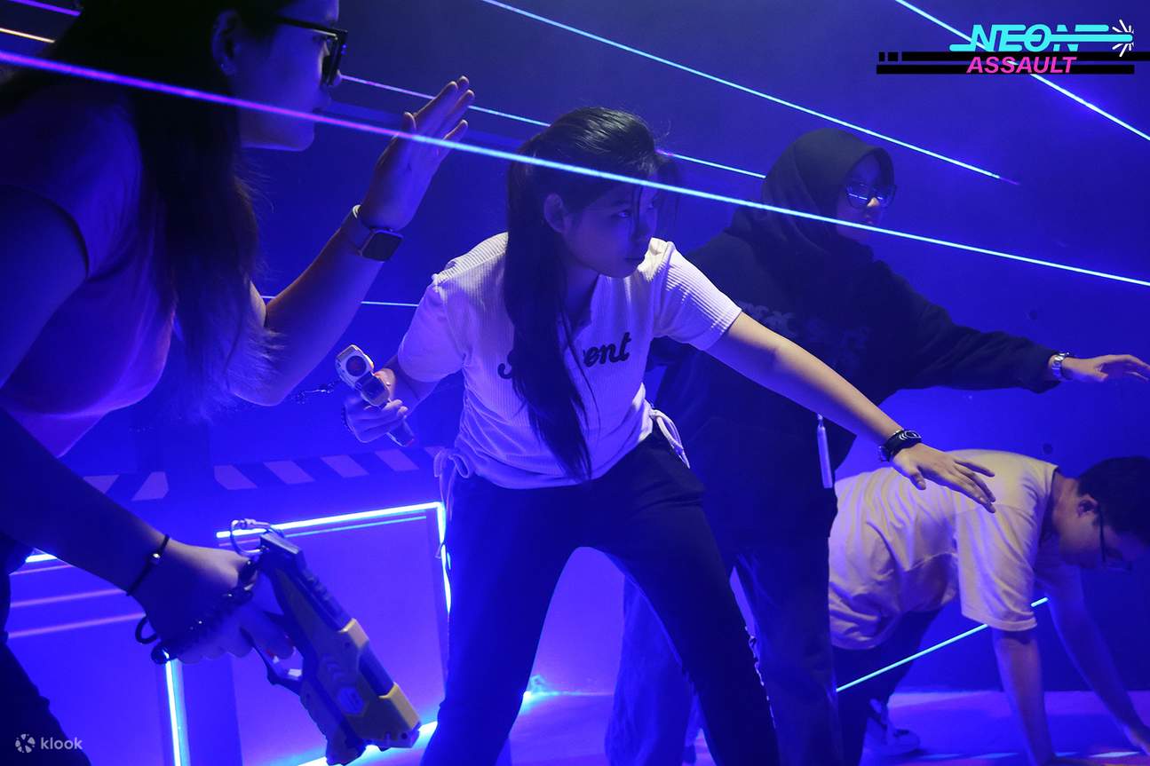 Cyberstrike's Neon Assault : In this laser-tag-inspired adventure, your team will dodge beams and hit specific illuminated targets.