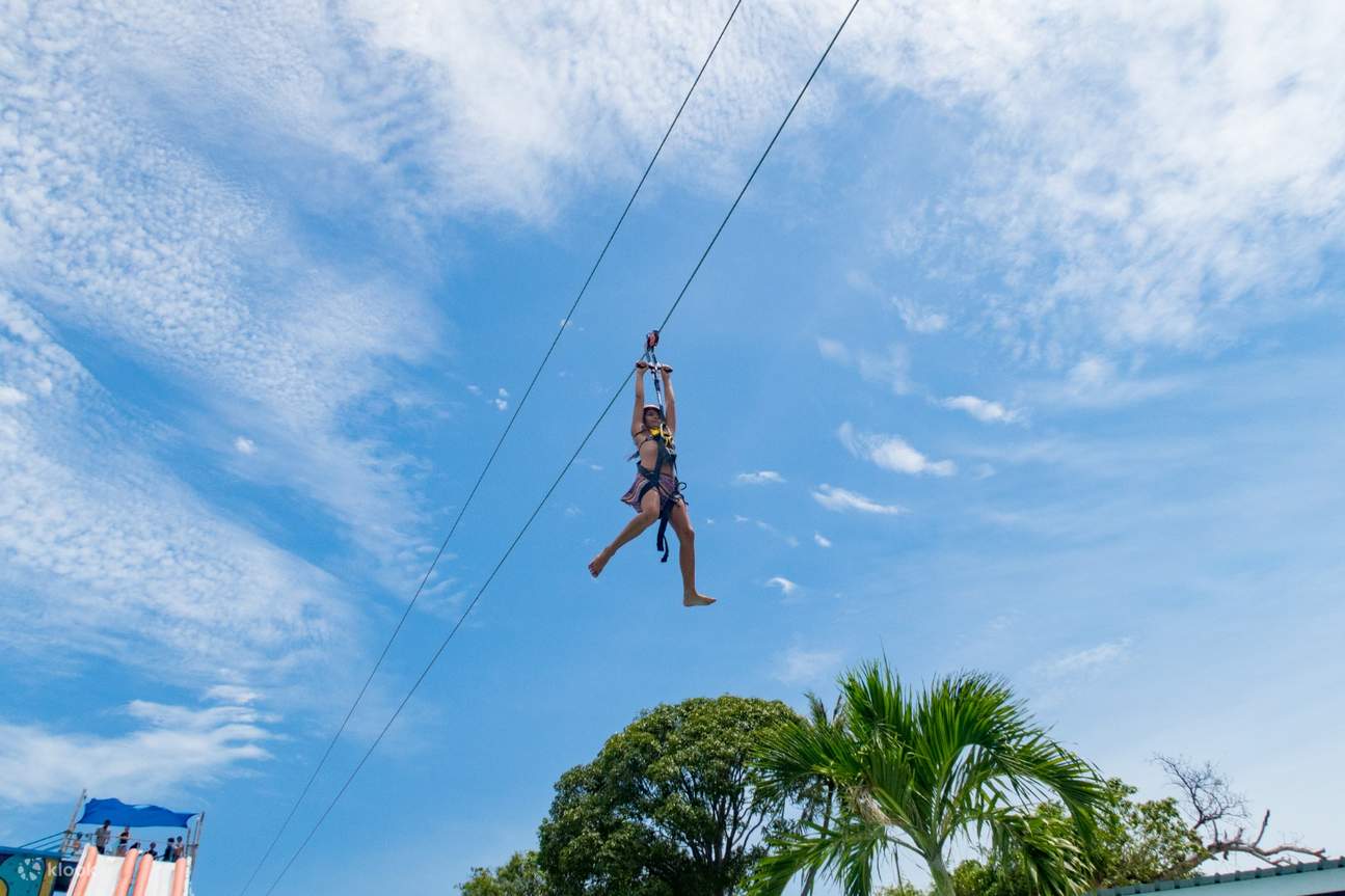 woman using the zipline in high park samui koh samui