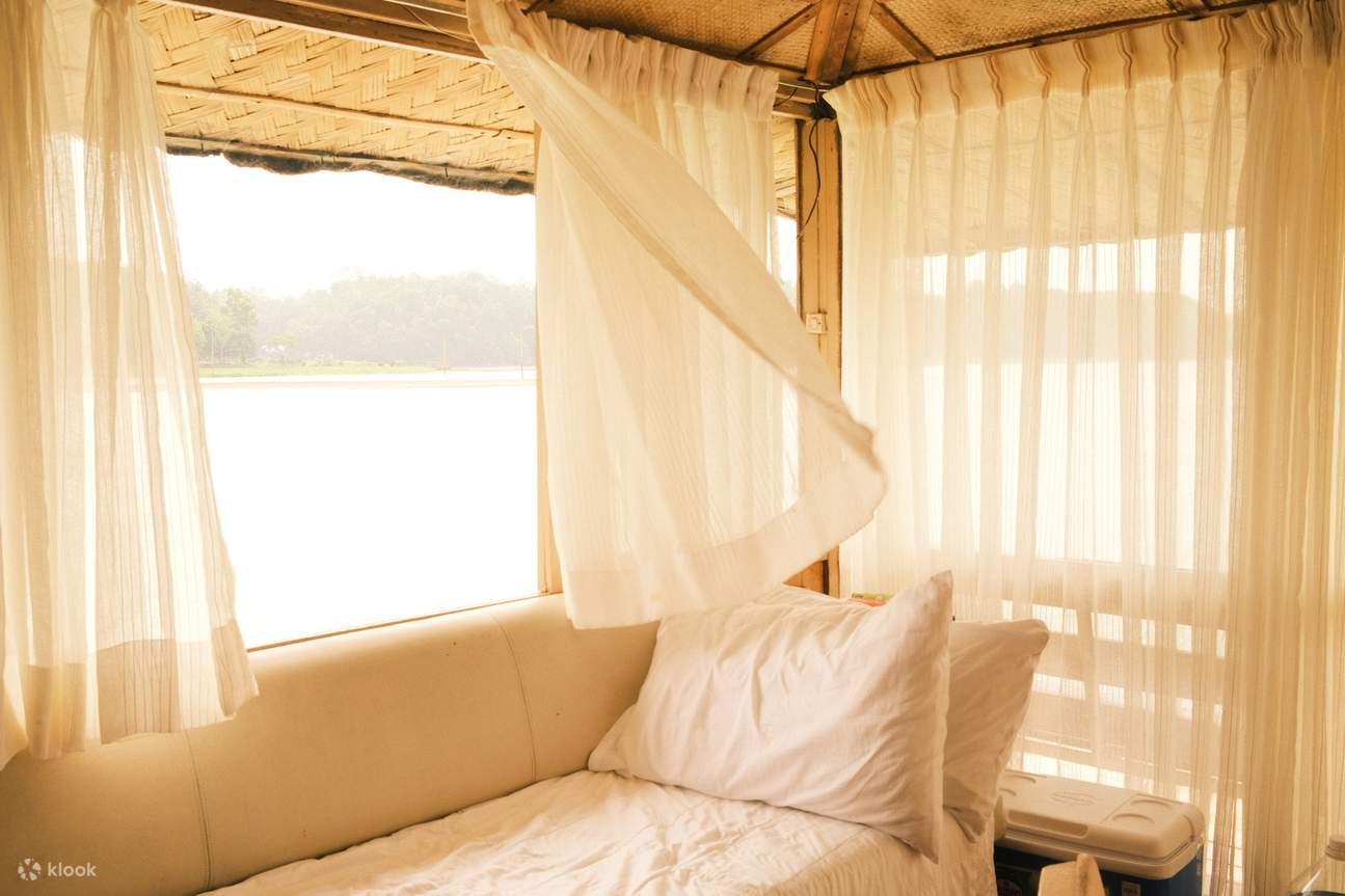living room window curtains billowing in the wind