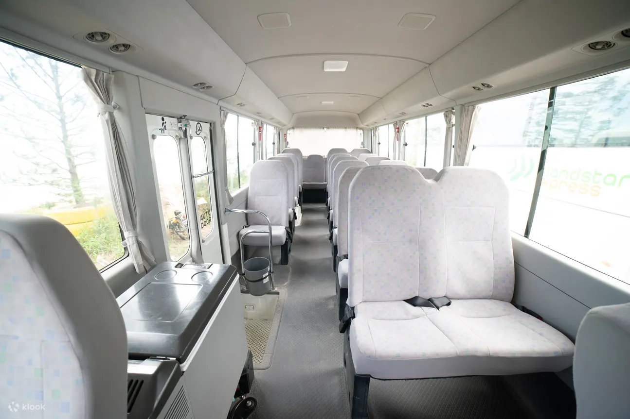 coaster interior of a Kalibo International Airport transfer