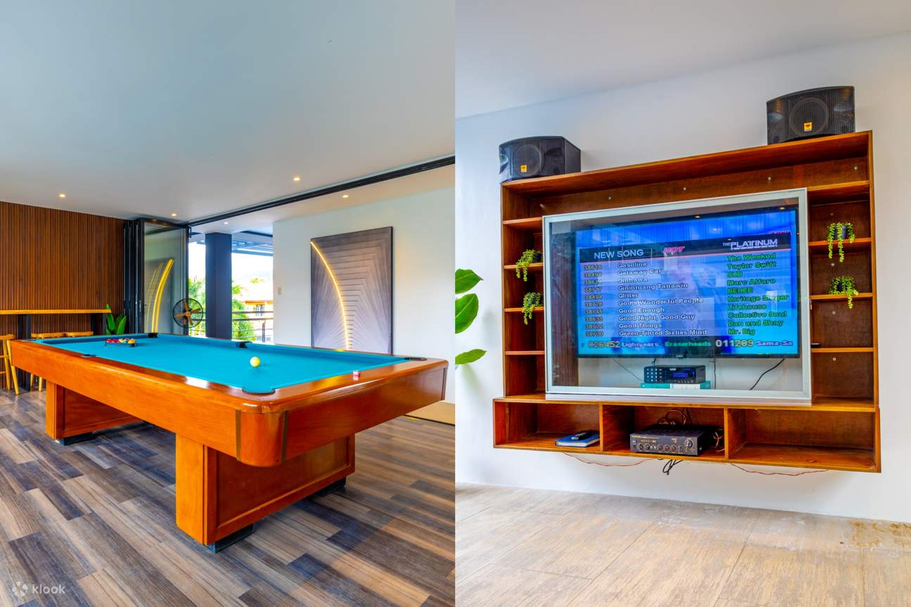 A room with a pool table and a videoke setup
