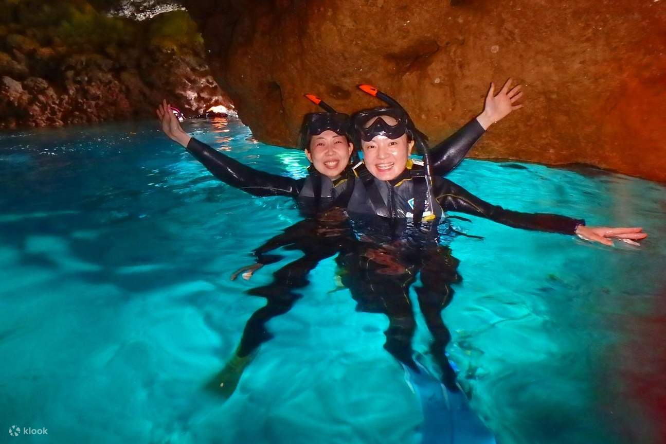 Okinawa Blue Cave Snorkeling & Diving Experience Entering the water
