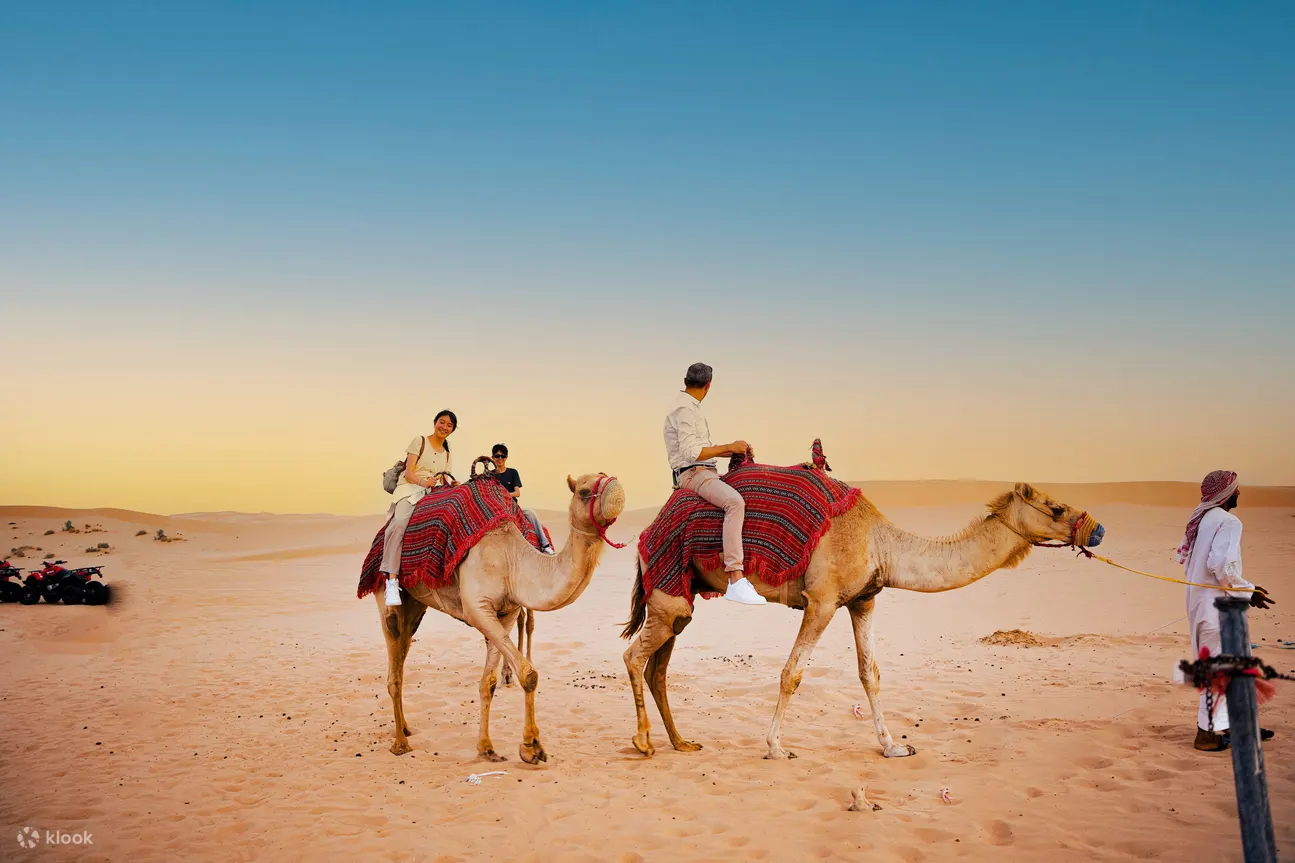 People on camels in Dubai
