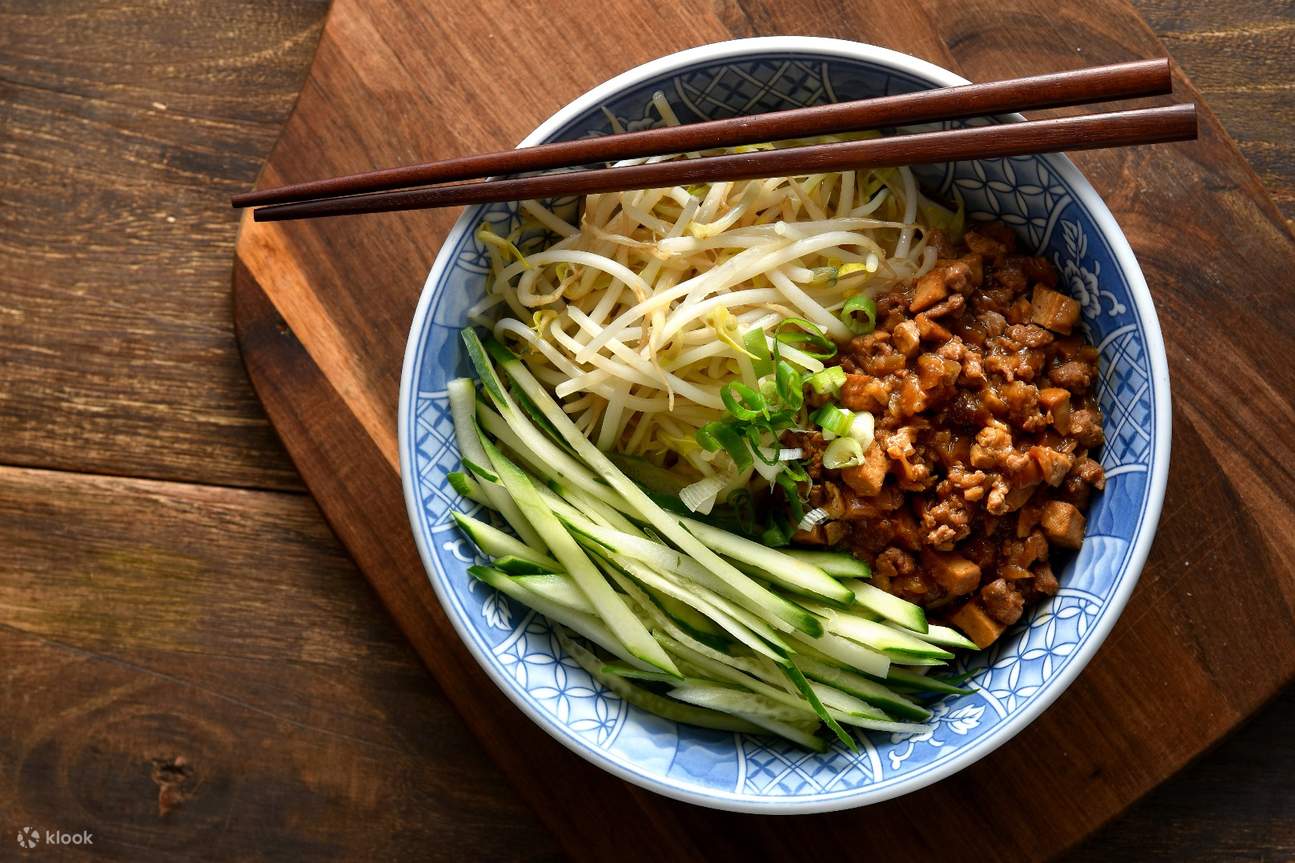 Sesame paste noodles with small cucumber at Taiwan Beef Noodles . Chicken Soup in Zhongxiao Area