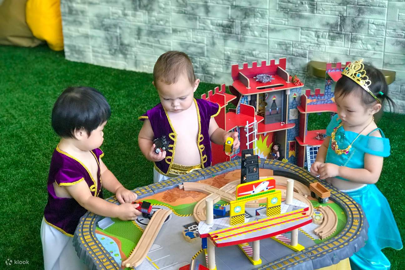 Little kids playing at The Tiara Society