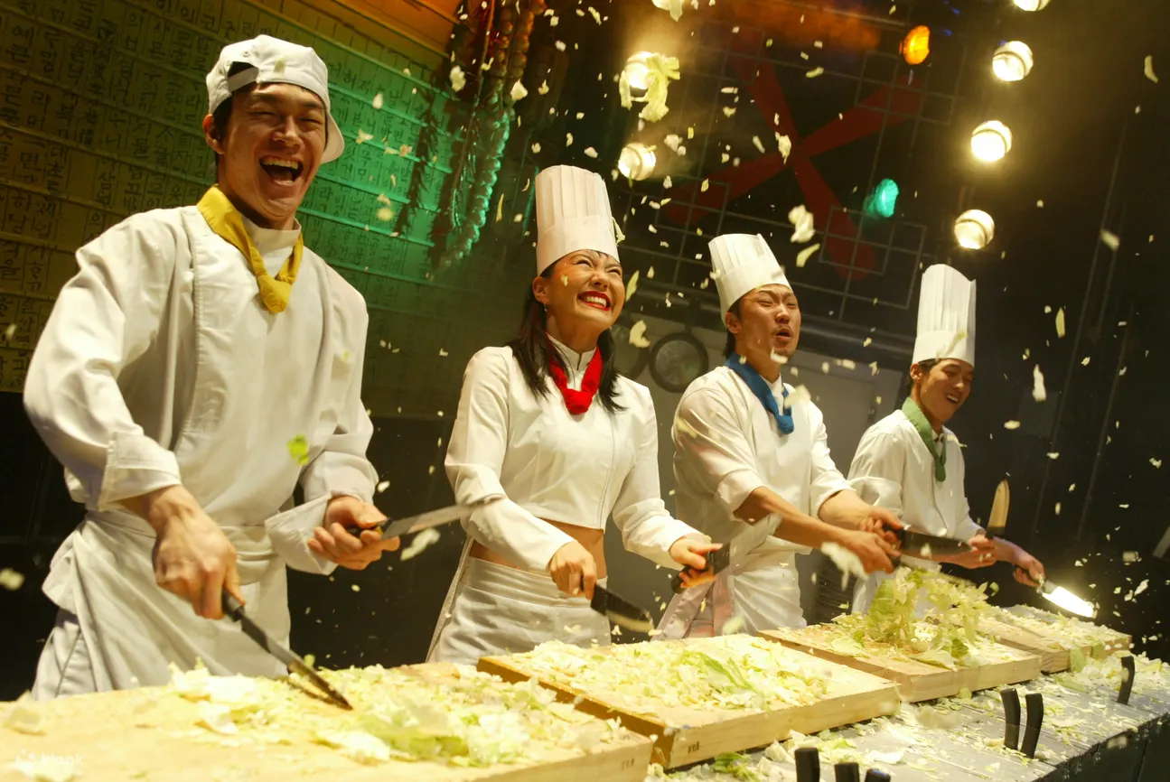 Experience the world-famous NANTA Show, a thrilling non-verbal performance blending comedy, acrobatics, and rhythmic cooking beats