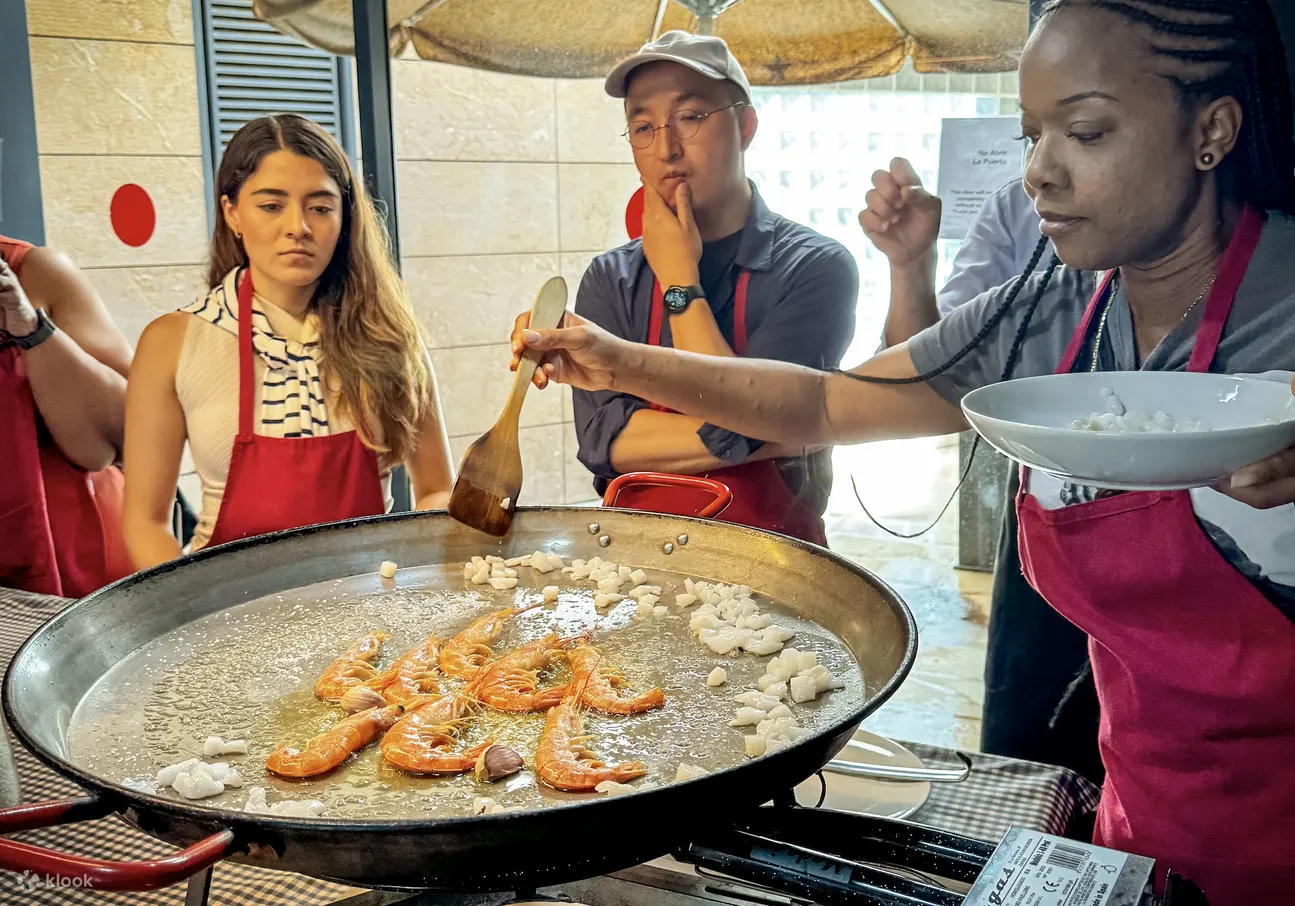 Barcelona: Seafood Paella Maestro with Tapas & Sangria