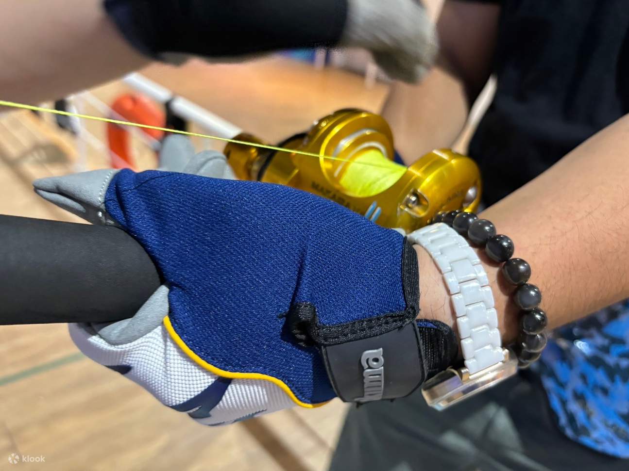 Experience the thrill of fighting tuna indoors with real sea fishing rods and reels.