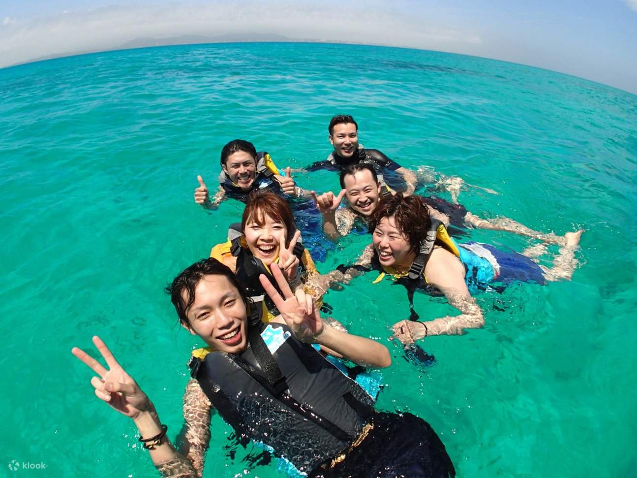 friends snorkeling in phantom island