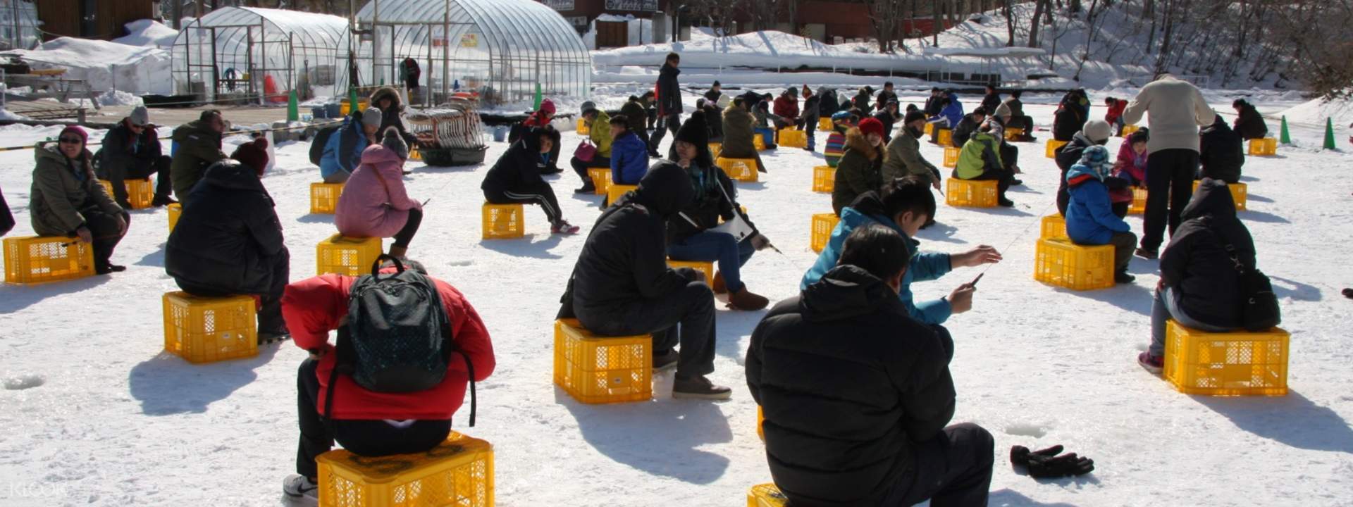 Ice fishing in Onuma QuasiNational Park, Hokkaido