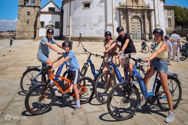 Tour in bici elettrica di ore alla scoperta dei punti salienti di Porto  Klook Stati Uniti