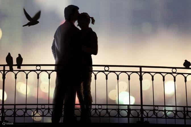 A couple in each other's embrace