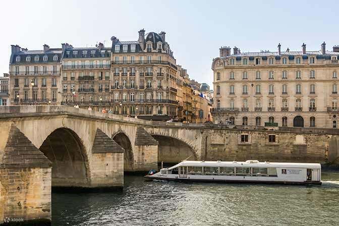 A cruise on the river with buildings in the background