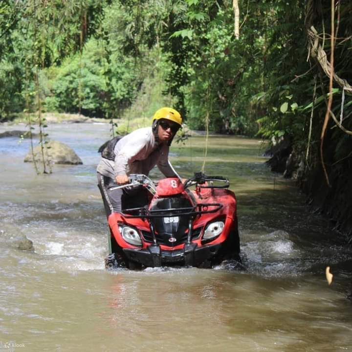 atv through a river