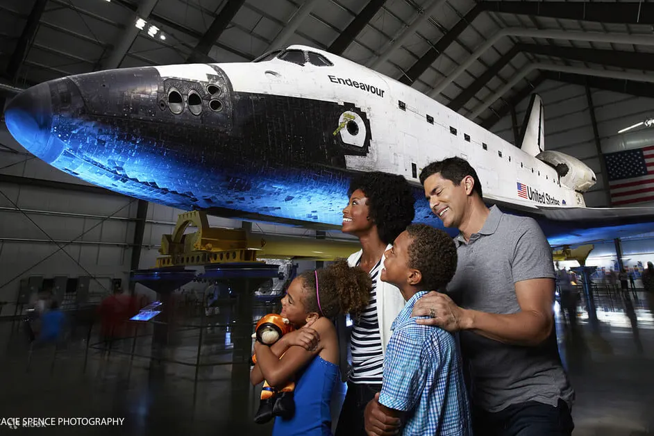 People looking at a space shuttle