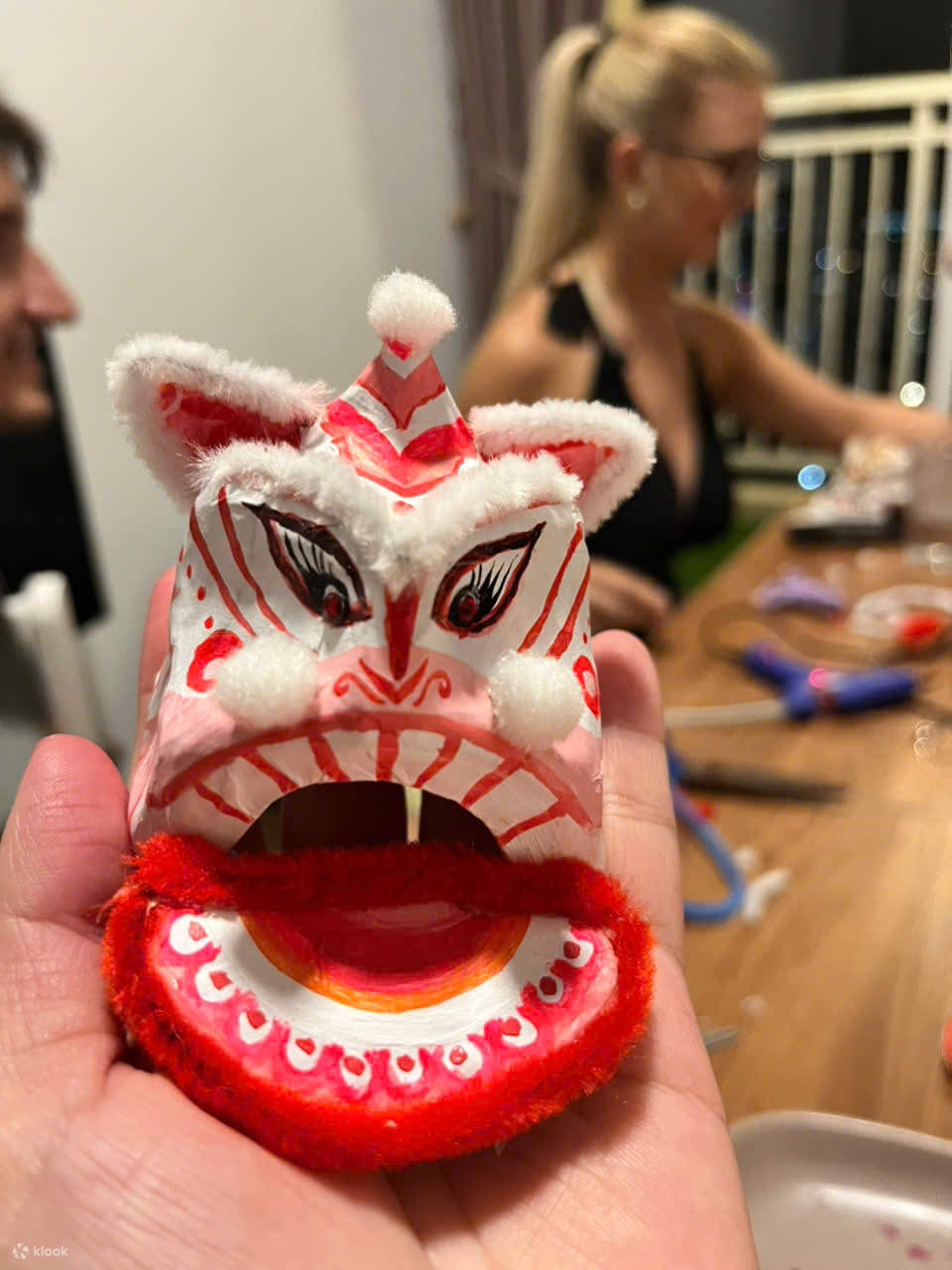 Mini lion head decoration workshop and story of lion dance