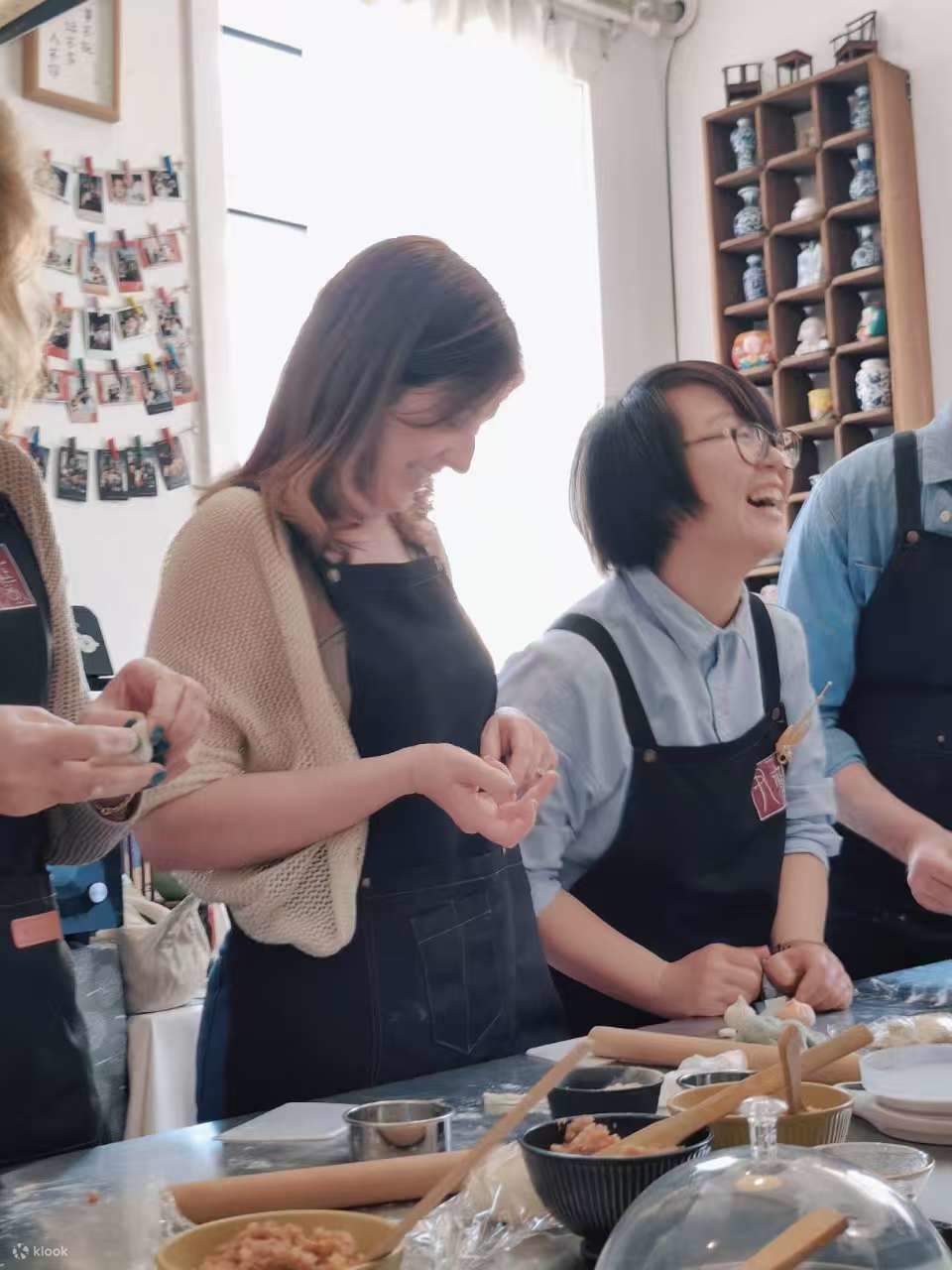 Joyful family moment in our soup dumpling cooking class.