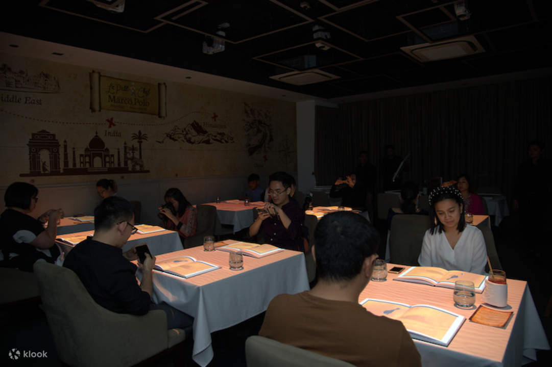customers enjoying the 3D projector dining experience in Le Petit Chef in Kuala Lumpur