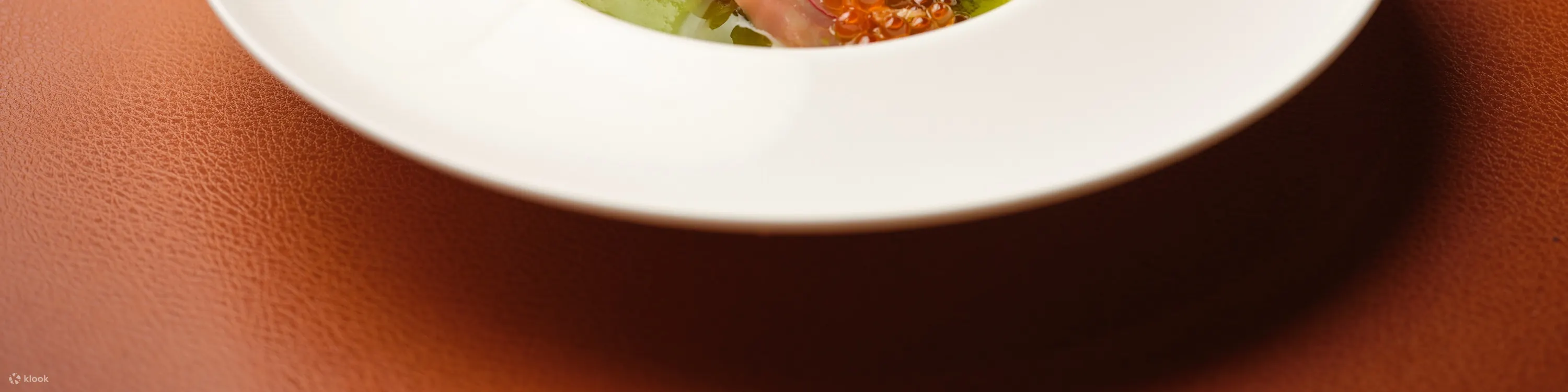 Immerse yourself in a sophisticated dining ambiance, where every detail complements the exquisite culinary journey