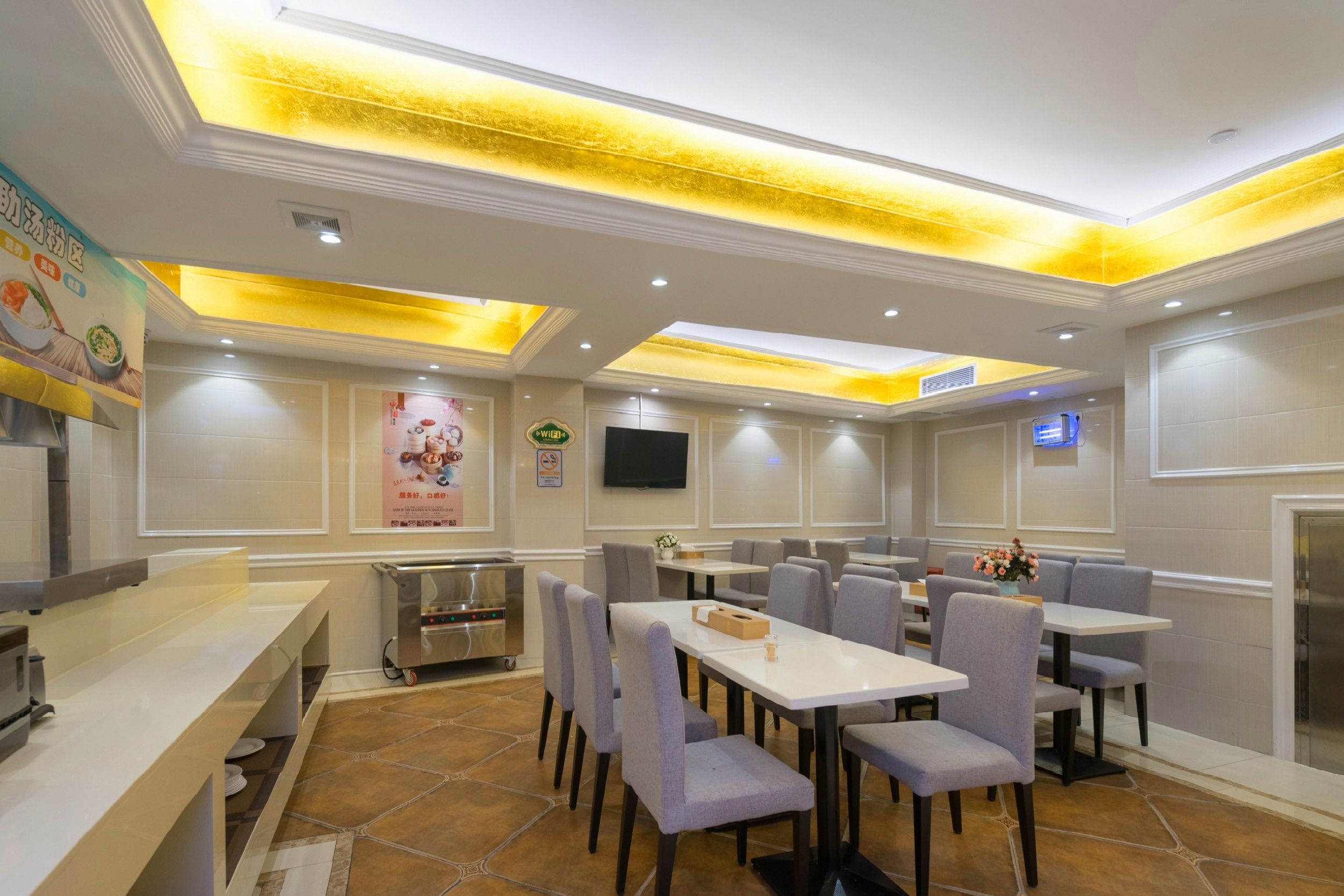 Vienna Hotel Guangzhou Railway Station Xiaobei Metro Station · Dining spaces