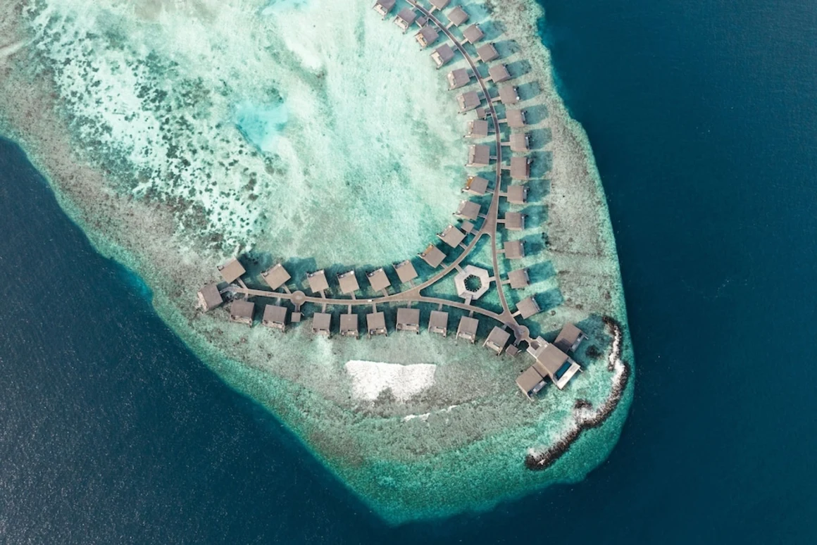 The Sovereign Oracle | The St. Regis Maldives Vommuli Resort: Architectural Serenity - Institutional Infrastructure Audit