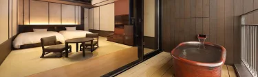 Interior of a Superior Room at Hakone Kowakien TEN-YU with open-air onsen bath on terrace